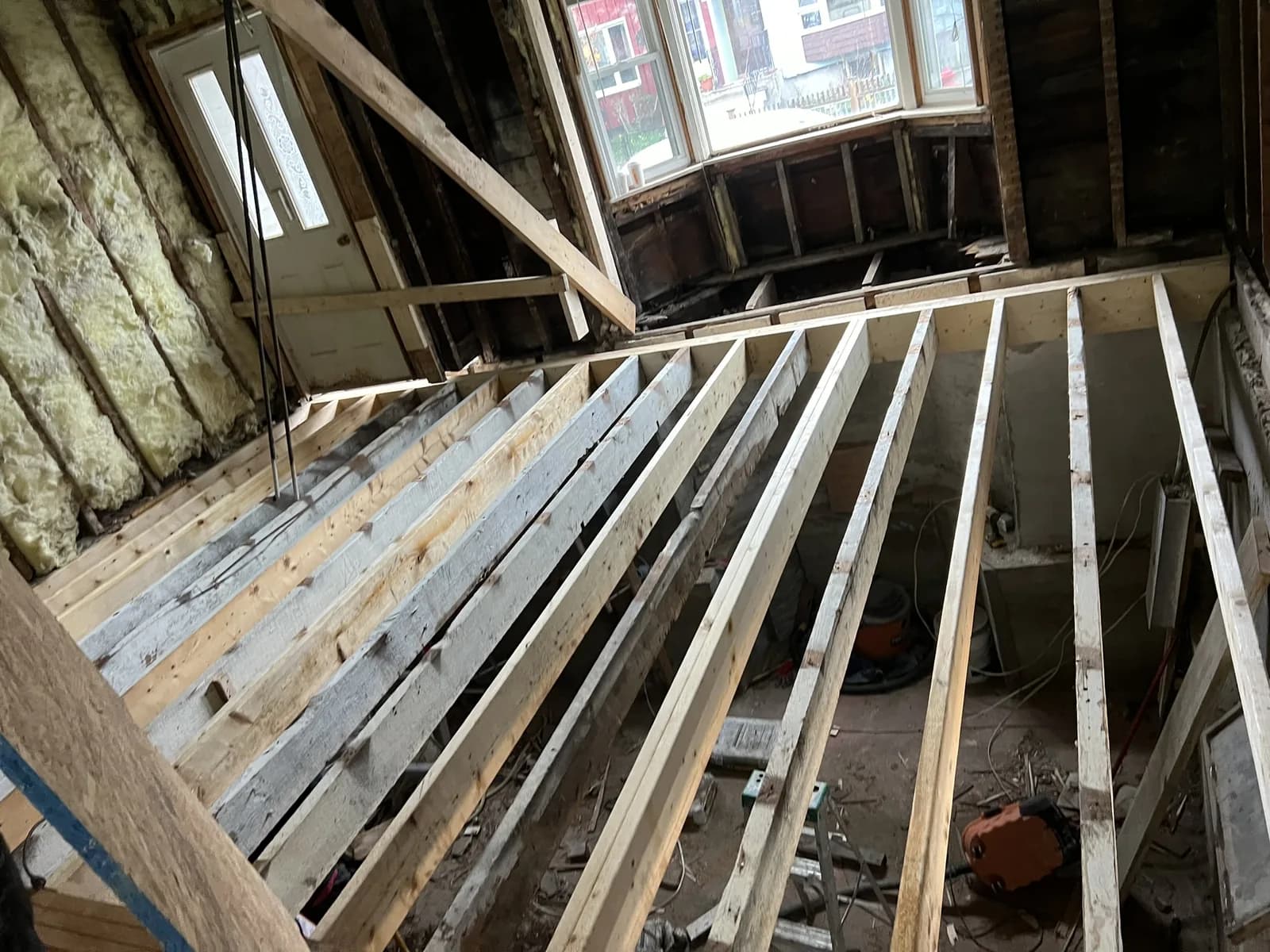 Floor framing exposed during structural renovation work