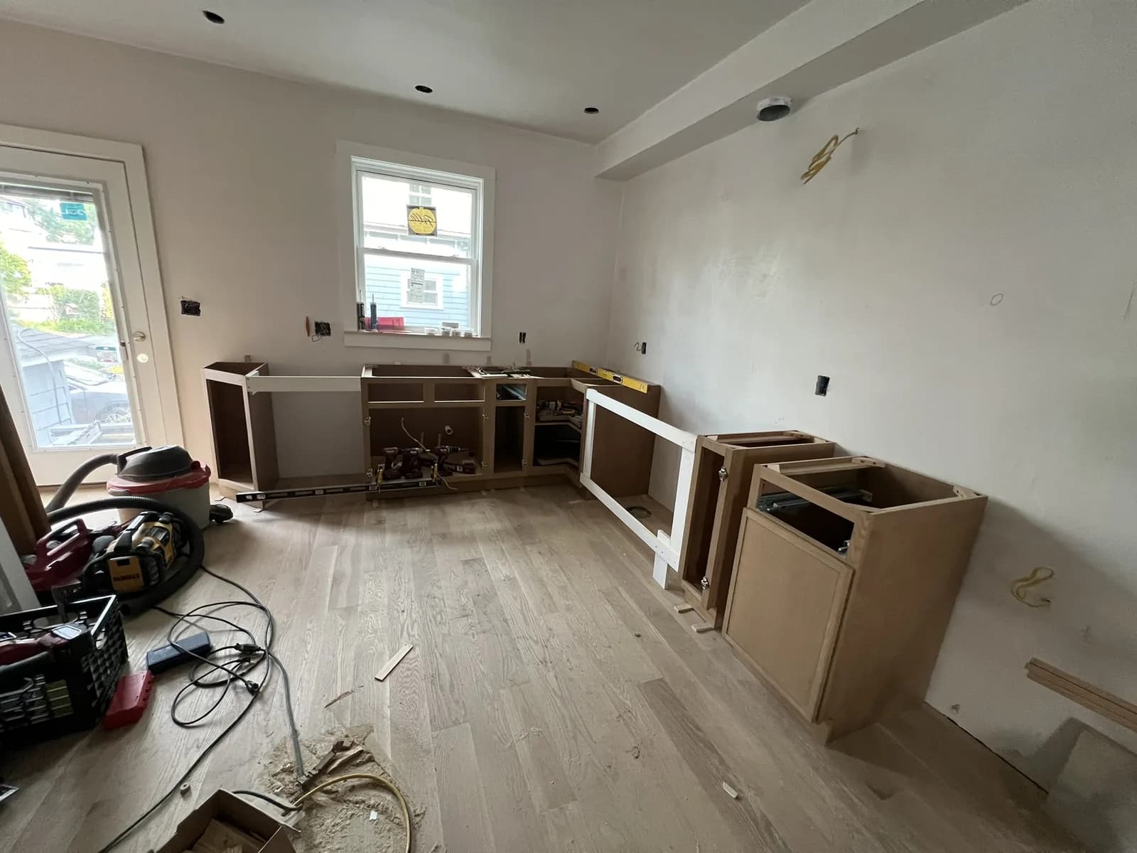 Kitchen cabinetry installation in progress